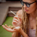girl with marijuana and cigarette